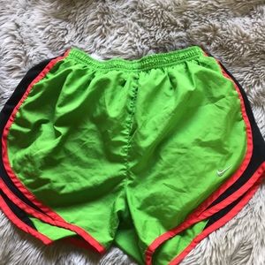 Nike Running shorts green with orange trim